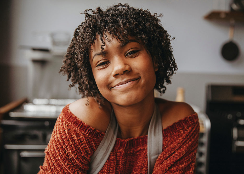 Teen smiling at camera